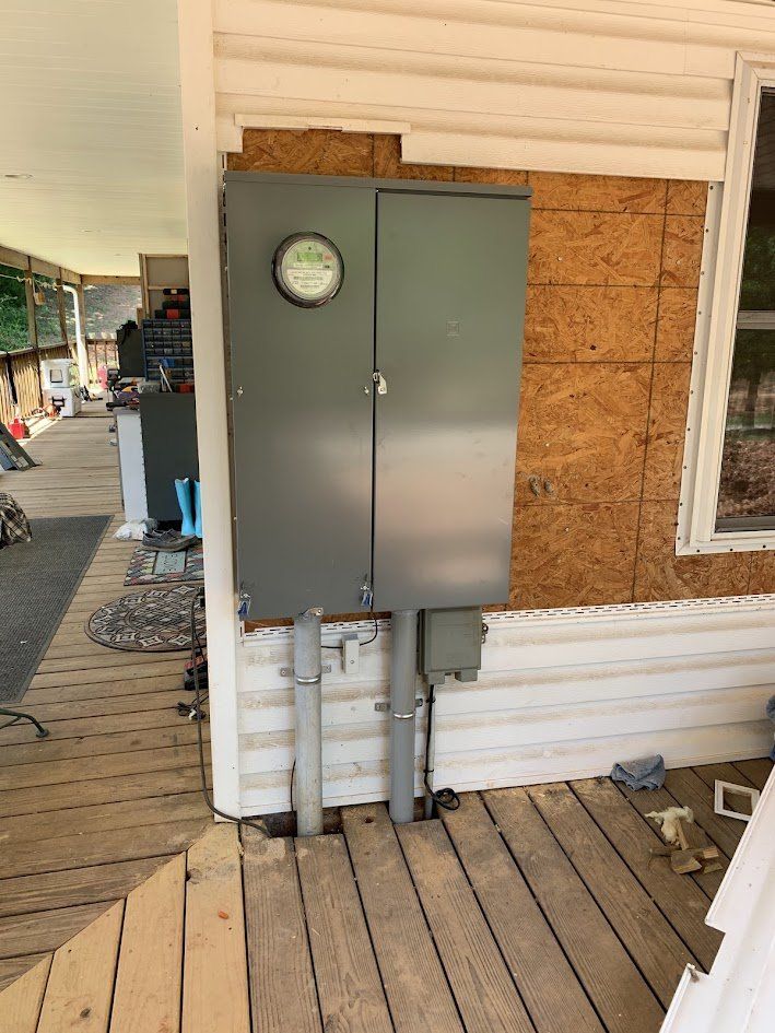 New 400-amp meter main installed on the porch wall
