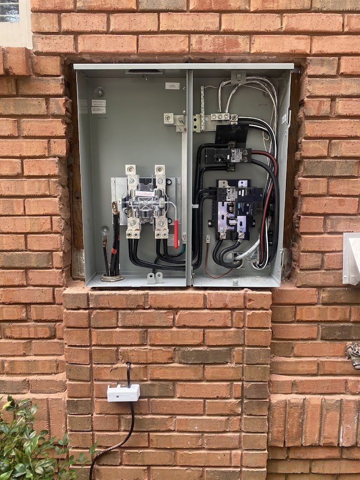 New 400-amp meter main installed and wired in the brick opening
