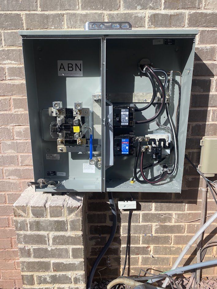 New meter main installed and wired on the brick wall