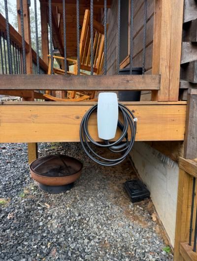 EV charger mounted on a wood post
