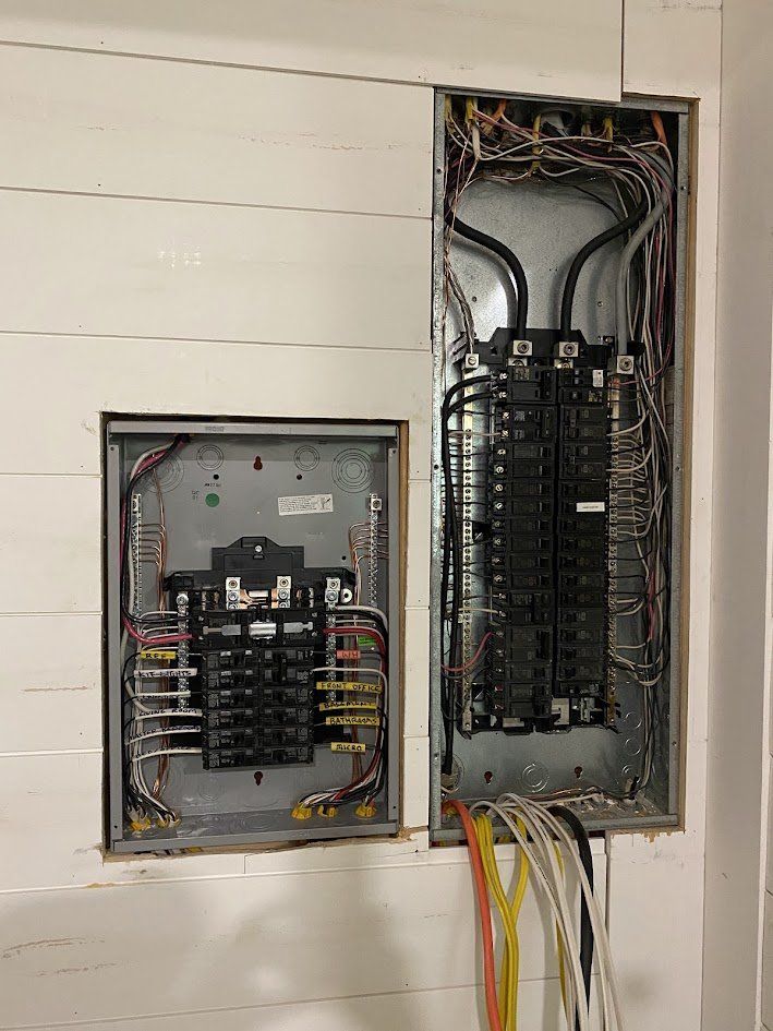 New generator subpanel installed beside the main panel