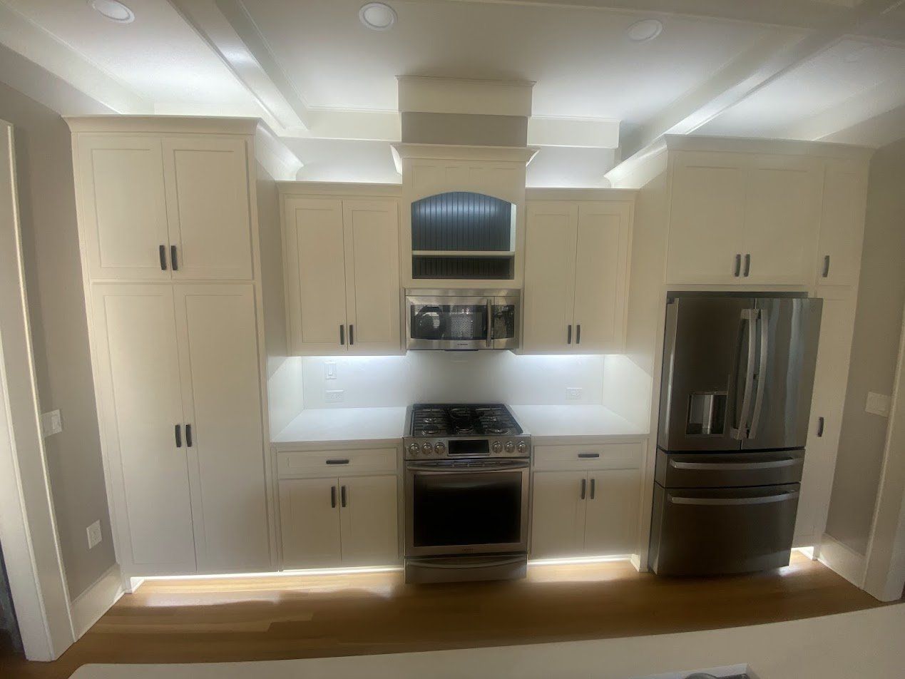 Kitchen with recessed lights, under-cabinet lighting and toe-kick lighting