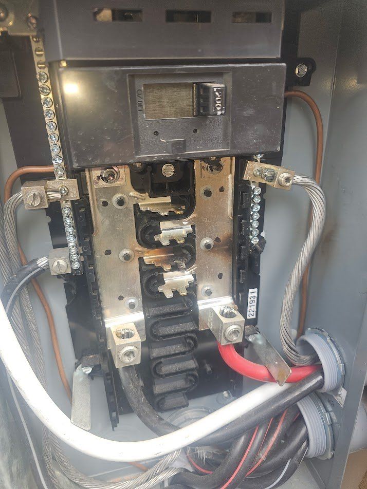 Panel interior with burned, damaged bus bars