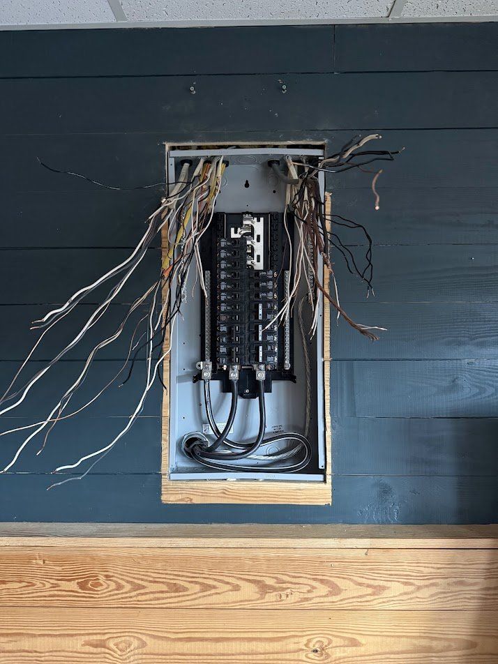 New panel set in the wall with circuits ready to be landed